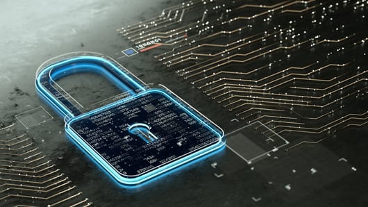 Padlock icon over a circuit board background, representing cybersecurity.