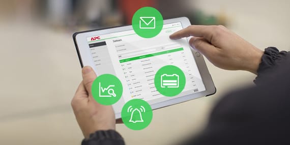 Tablet displaying the SmartConnect dashboard with icons for envelope, battery, bell & graph with trends.
